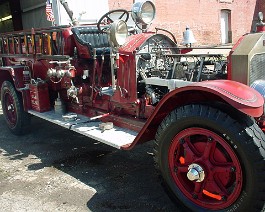 Many fire apparatus extras have been added to this truck since its purchase. Two Dietz Fire King lanterns, four inch soft suction hose, breathing equipment, fire axe, period ALF foamite extinguishers, Baker deck gun, Indian "back pack" fire extinguishers, and many different sized brass nozzles.